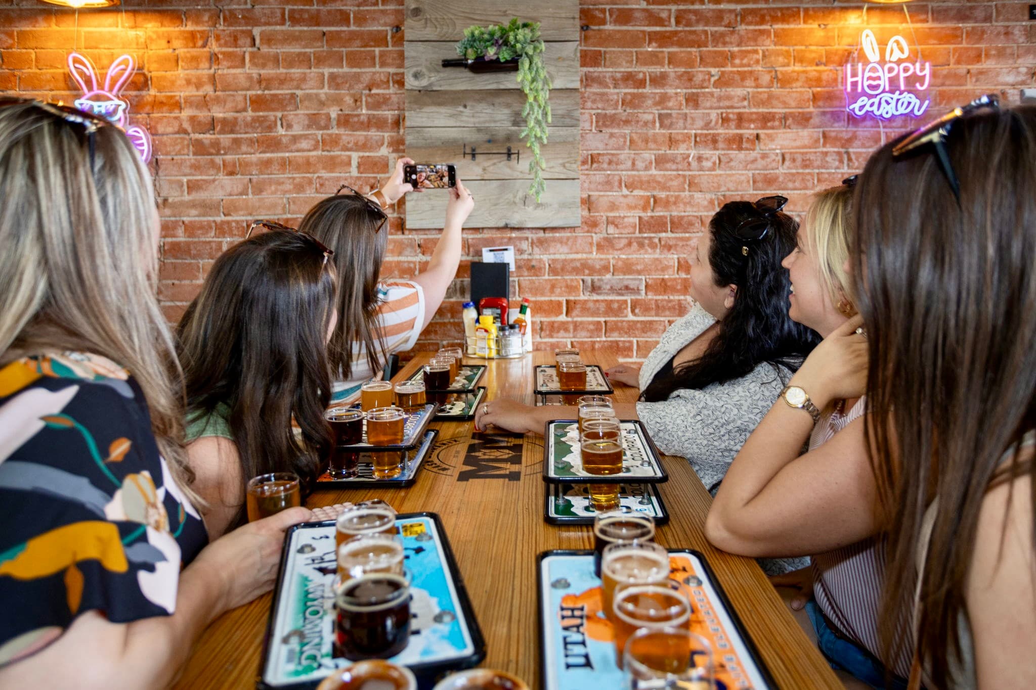 Friends raising margaritas on a Colorado Springs bachelorette tour