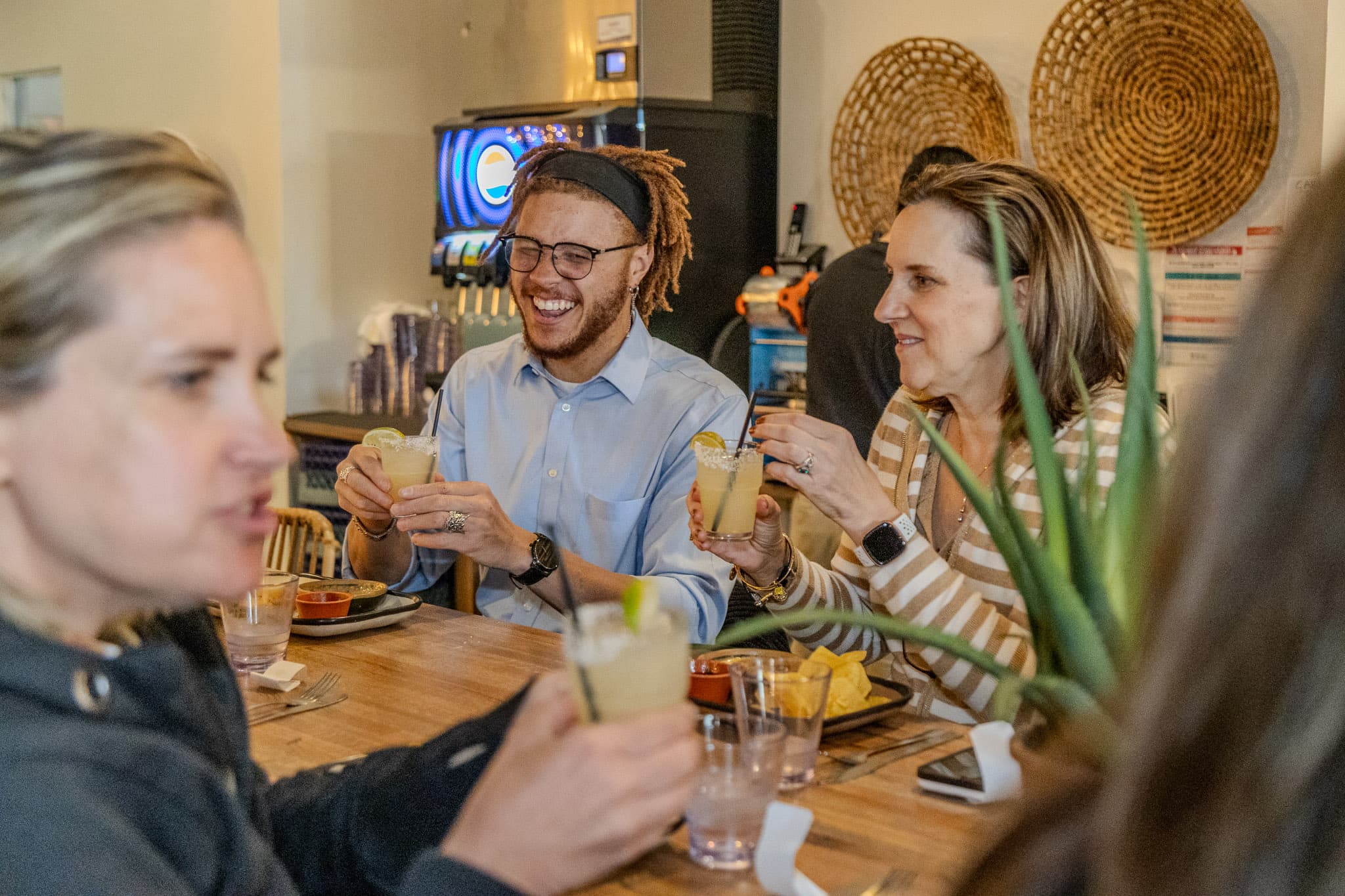 Corporate group celebrating on a Rocky Mountain Food Tour in Colorado