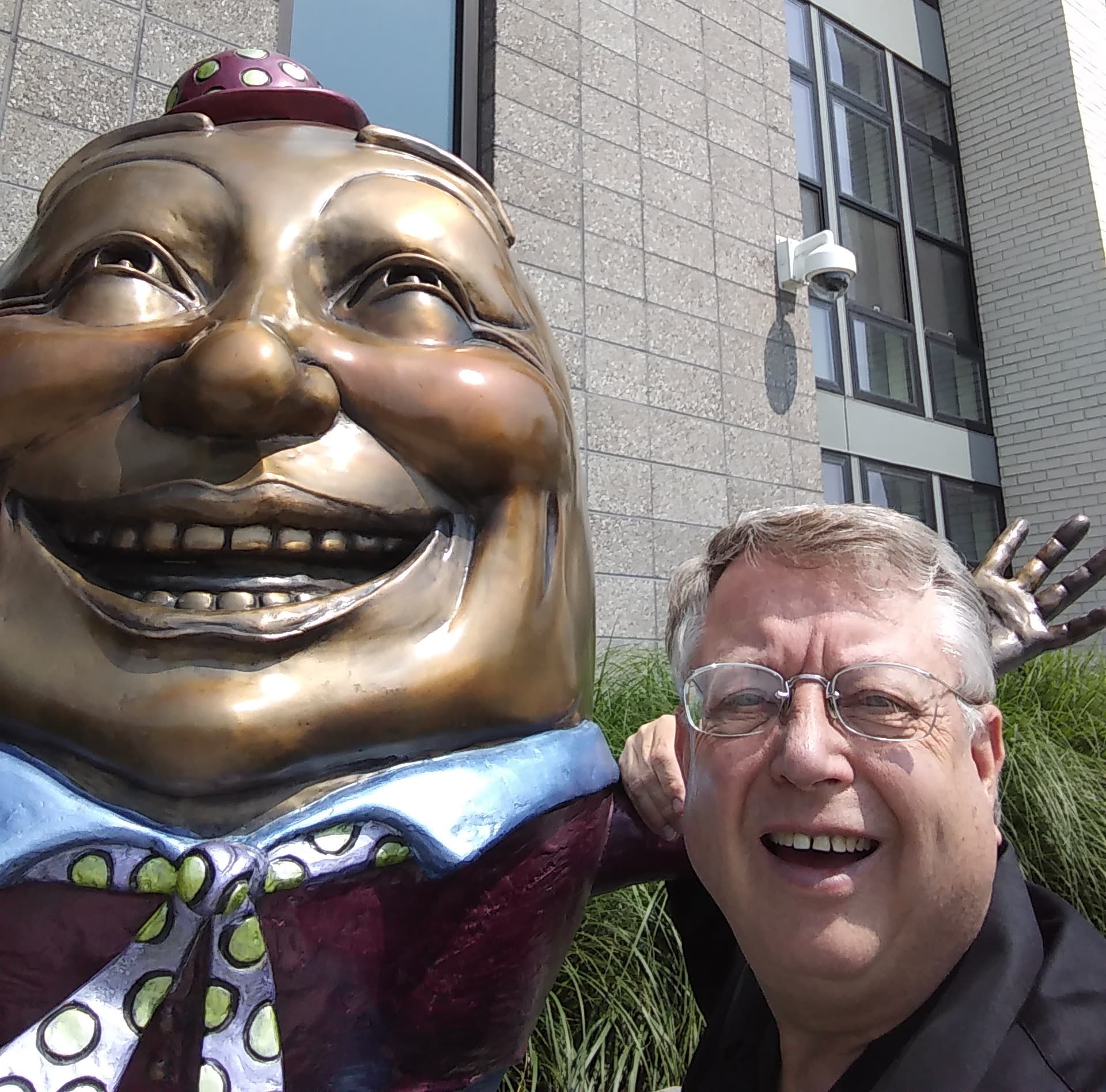 Roger posing with one of the Humpty Dumpty bronze egg sculptures in downtown Colorado Springs