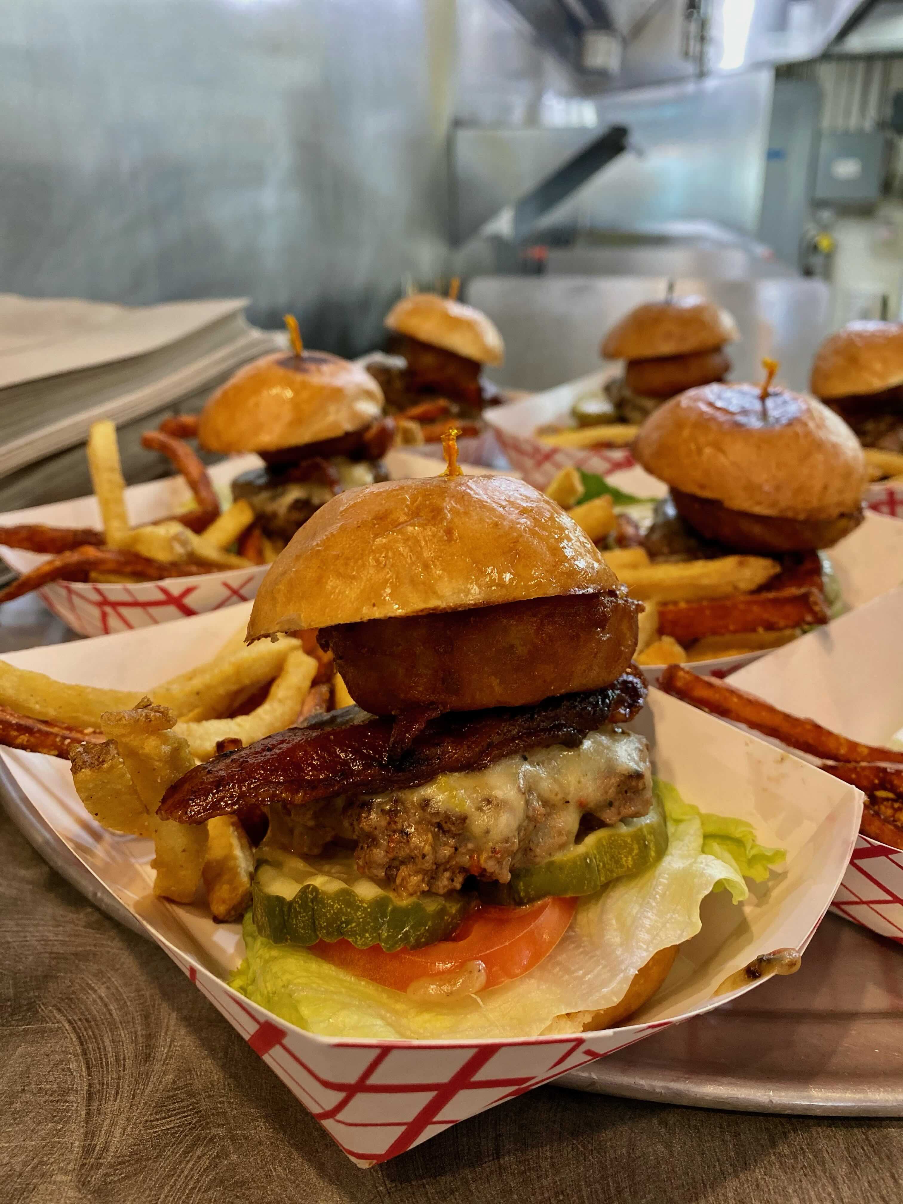 Signature burger plated on a Rocky Mountain Food Tour stop in Colorado Springs
