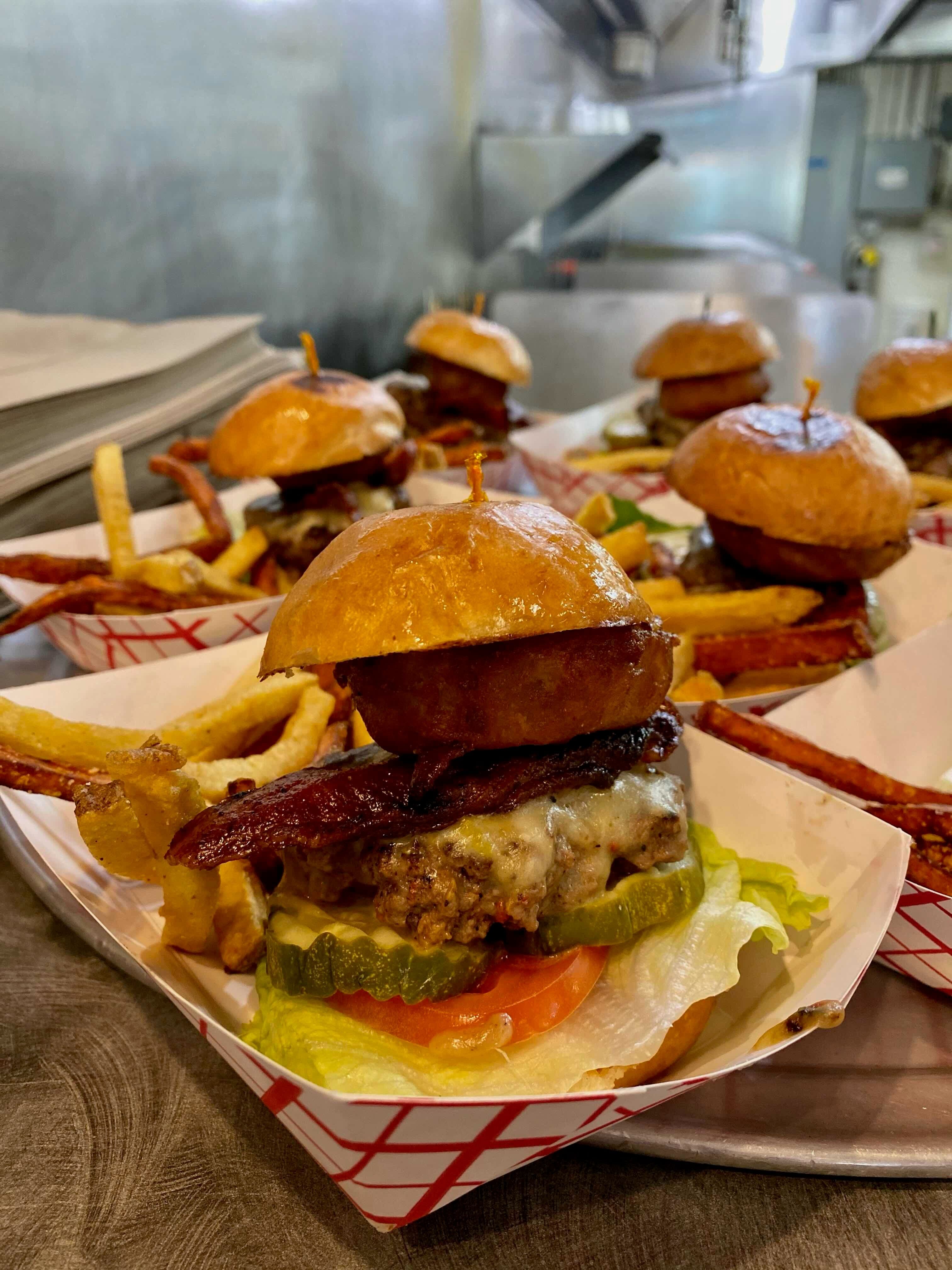 Signature burger plated on a Rocky Mountain Food Tour stop in Colorado Springs