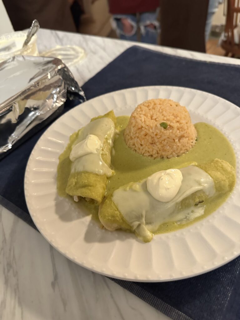 Final plated dish of Enchiladas Suizas