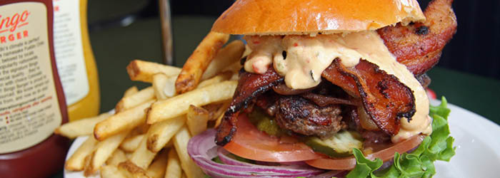 Pueblo Green Chili stuffed burger patty with bacon, aged cheddar, and award-winning sauce from Bingo Burger