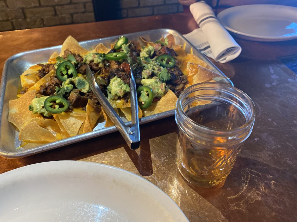 Beef Brisket Hash Nachos and Apple Pie Moonshine at Bootleggers © Rocky Mountain Food Tours