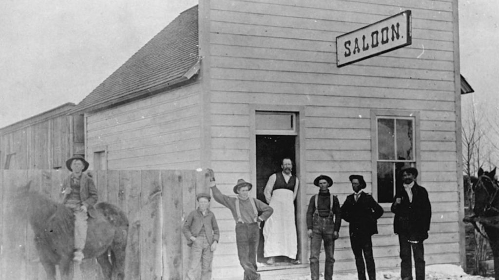 Men Standing Outside a Saloon in Old Colorado City