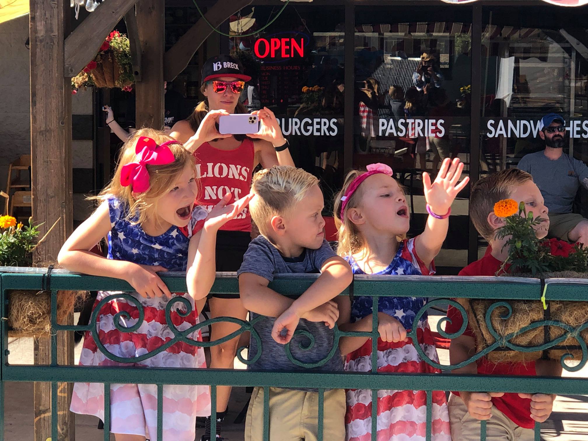Kids Watching 4th of July Parade | Tri-Lakes Chamber of Commerce