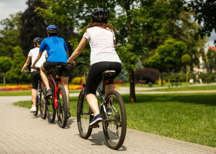 Family Biking Away on E-Bikes in Manitou Springs