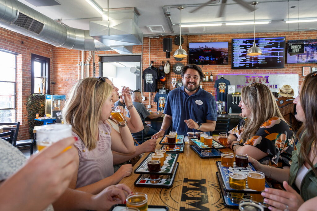 Brewery Tour Colorado Springs table with guide
